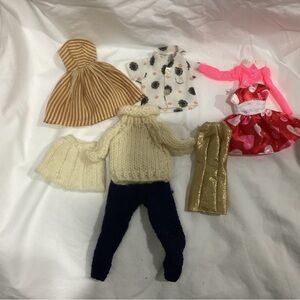 Vintage collection, Barbie, hand knit outfits and store bought. Pre-owned.